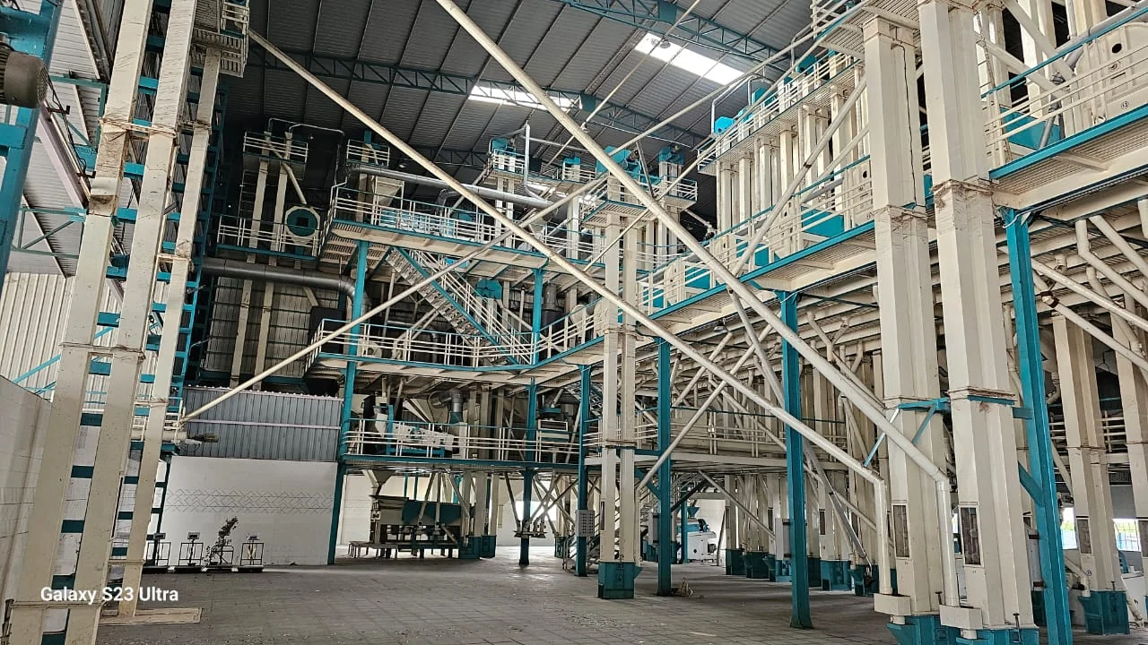 An installed milling plant with steel structures and interconnected processing equipment